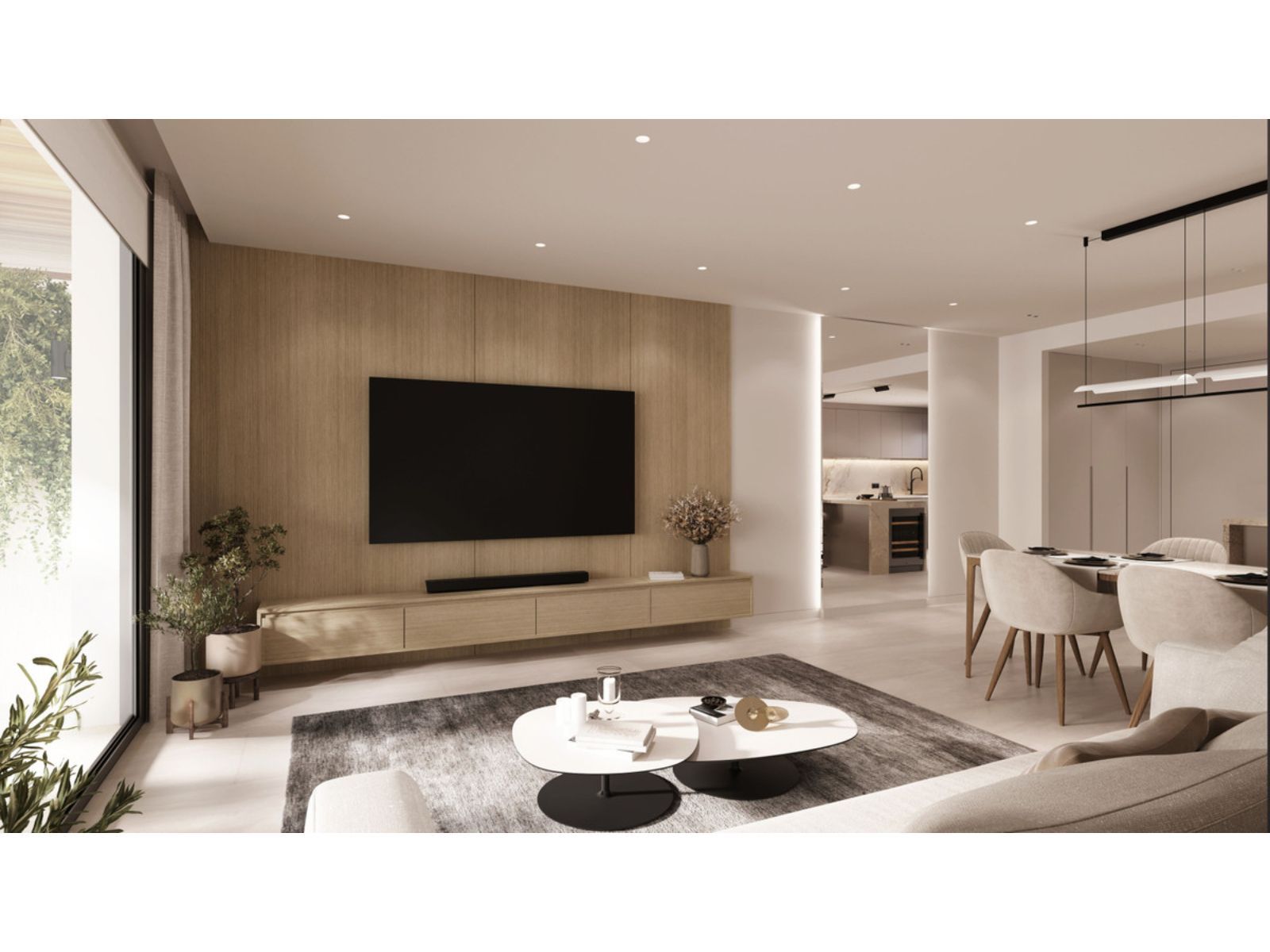 Stilvolles Wohn- und Esszimmer mit Fernseher und Designermöbeln.